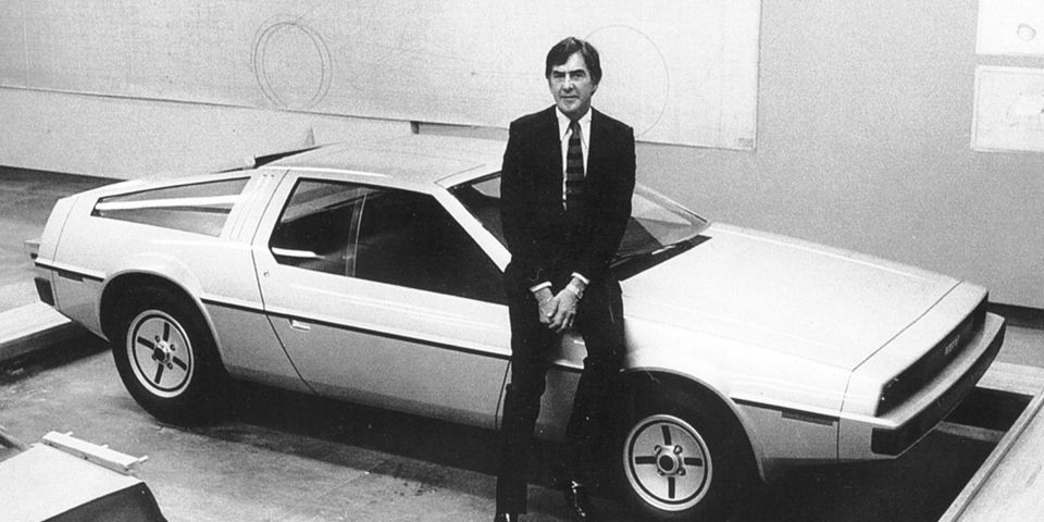 John DeLorean with car